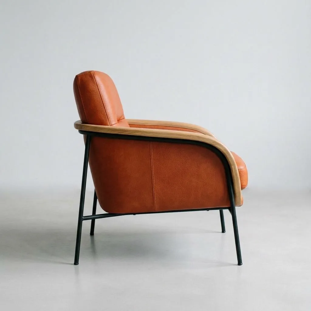 The same armchair in profile, showing the curved oak side