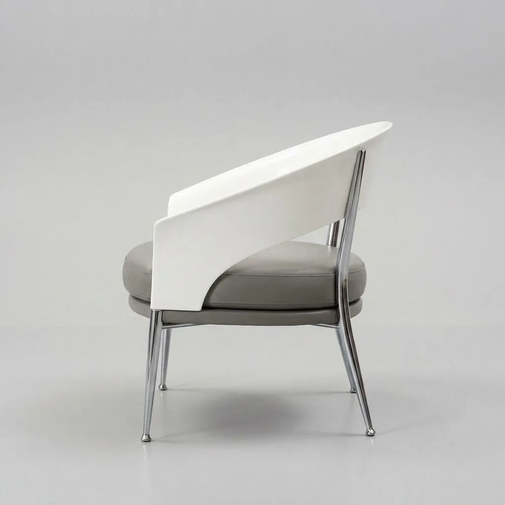 The same armchair in profile, showing the crescent back