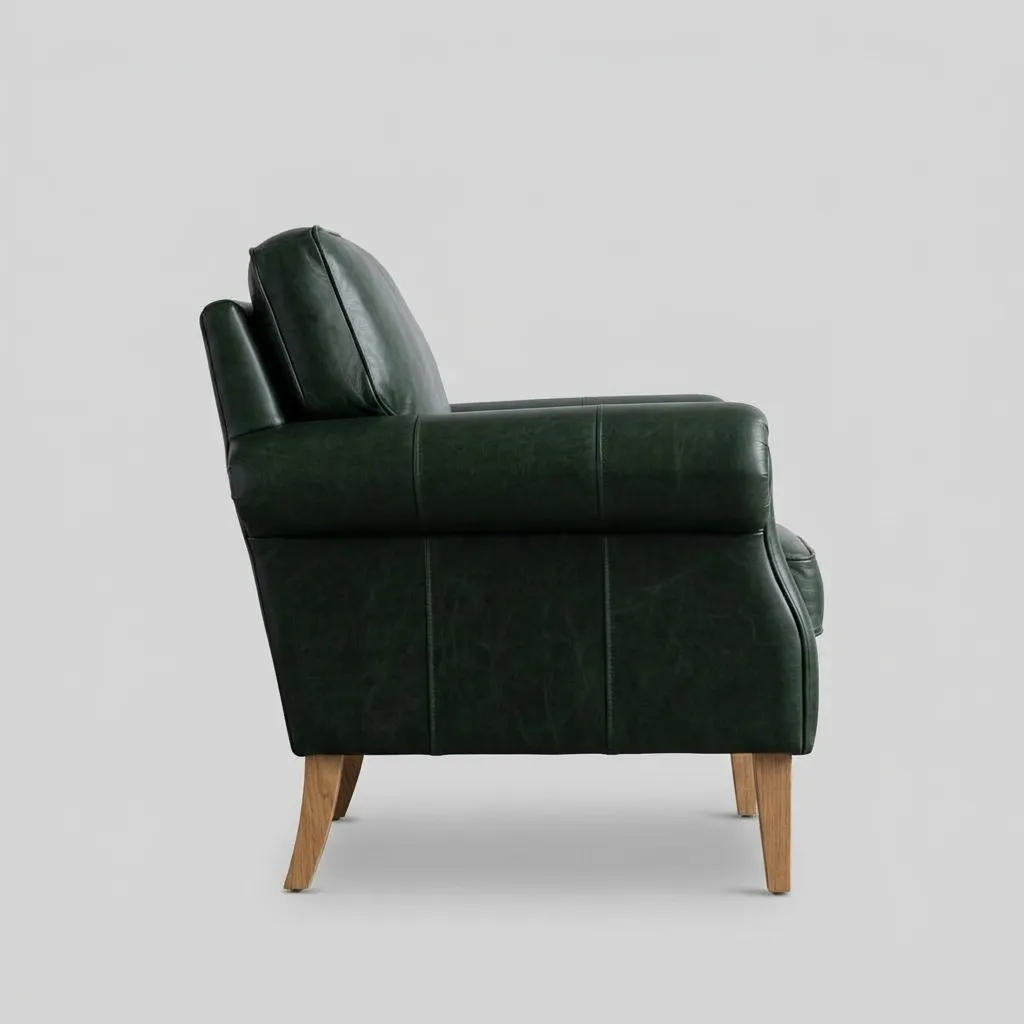 The same armchair in profile, showing the rolled arm and the oak legs
